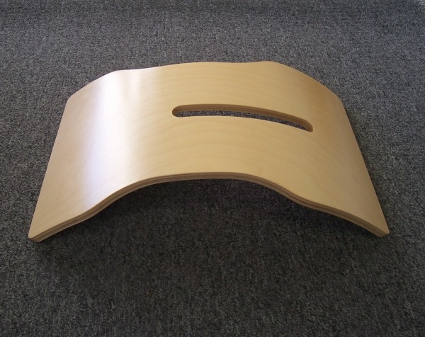 Clear lacquered bent wood chair back with a center slot, available in bulk for high-volume furniture production.